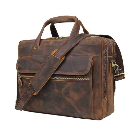 Brown leather briefcase with top handle, front flap and two zip compartments