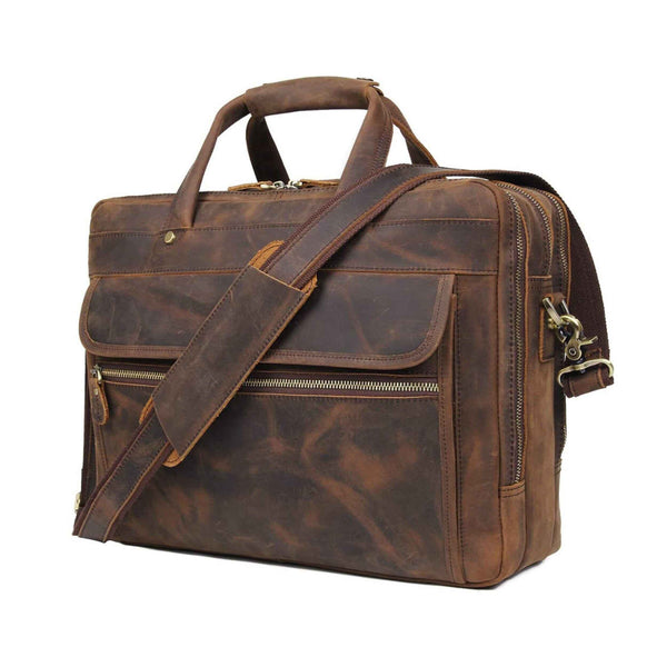 Brown leather briefcase with top handle, front flap and two zip compartments