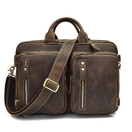 Brown leather 2-in-1 briefcase with top handle, front zip pockets, and shoulder strap