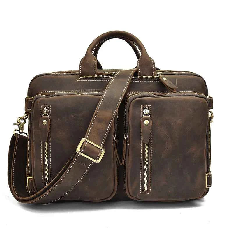 Brown leather 2-in-1 briefcase with top handle, front zip pockets, and shoulder strap