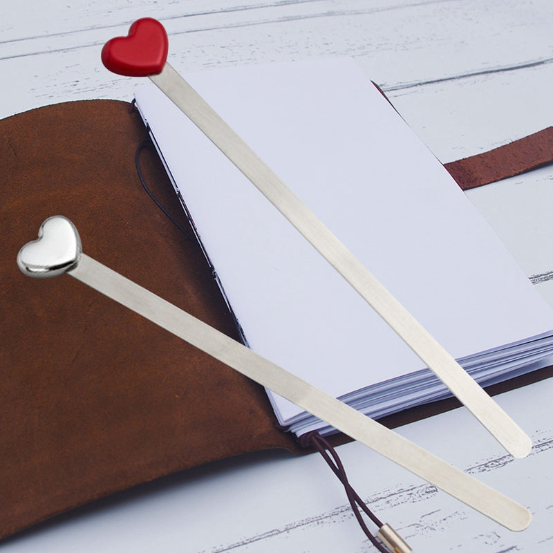 Red heart metal bookmark with slim silver body and heart-shaped clip end