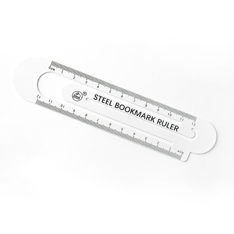 White hollow steel bookmark ruler with 12 cm measurement scale and hanging loop.