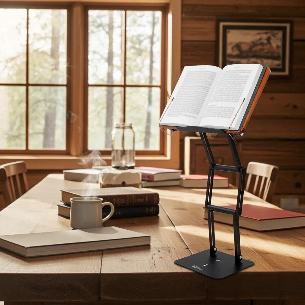 Adjustable reading setup with elevated book stand supporting an open textbook at eye level on a wooden desk in a natural home study environment