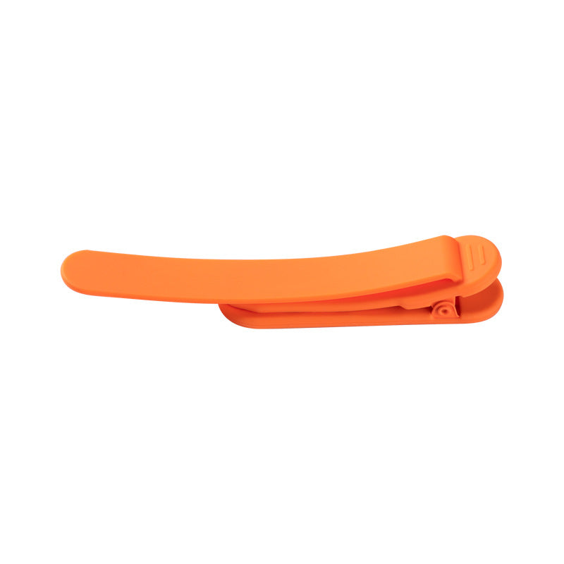 Silicone reading bookmark clip in orange, open claw design