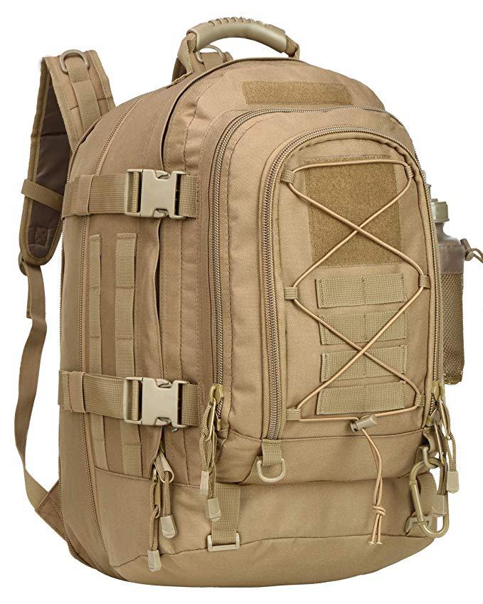 Tan tactical backpack with front zip compartment, MOLLE webbing, and padded shoulder straps.