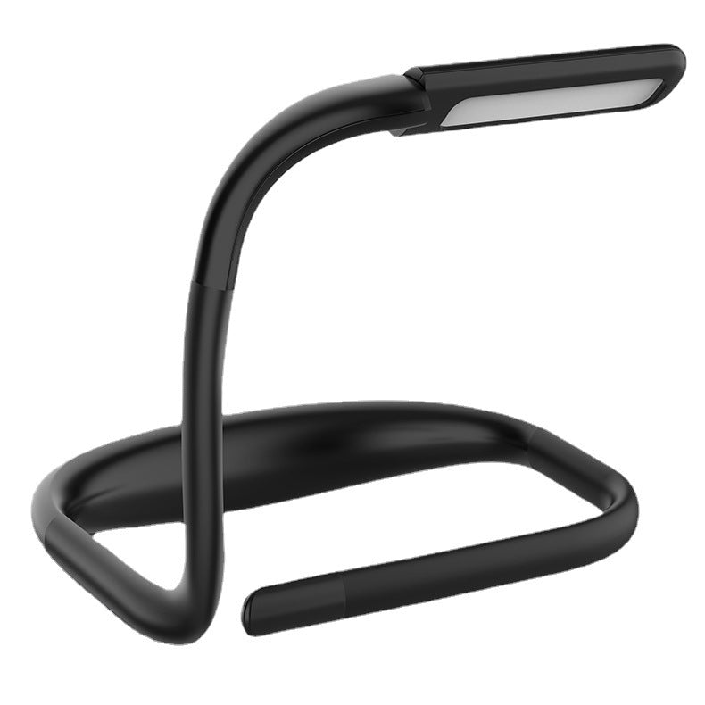 Hands-free neck reading light in black, arched frame with LED light bar and loop base.