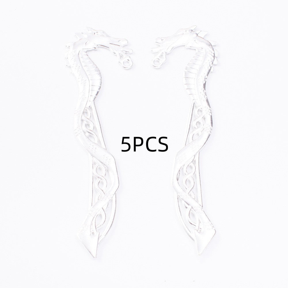 Two silver vintage seahorse bookmark charms with swirling filigree