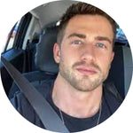 Profile of a medical student using an ergonomic book stand to prevent neck pain during long study sessions.